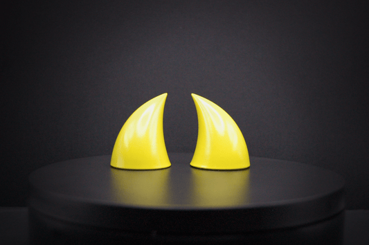 Front view of imp devil horns in sulfur yellow with a glossy finish.