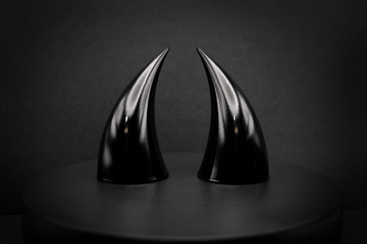 Front view of incubus devil horns in black with a glossy finish.