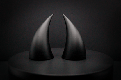 Front view of incubus devil horns in black with a matte finish.