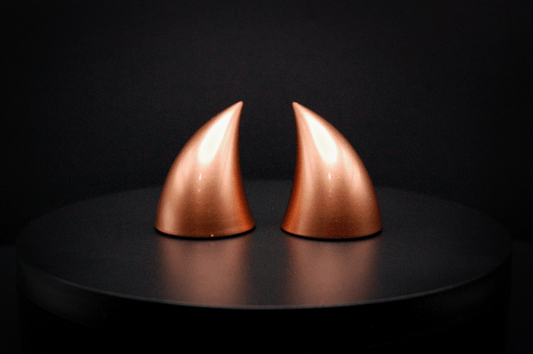 Front view of imp devil horns in metallic copper.