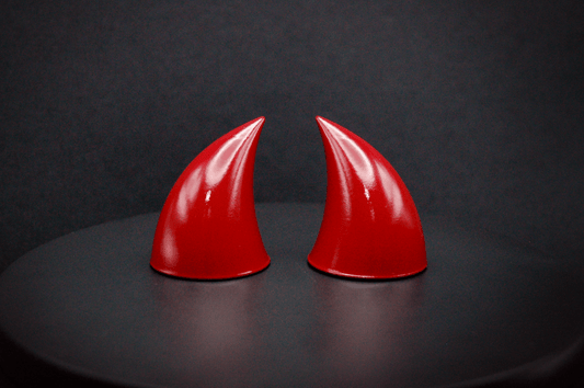 Front view of imp devil horns in bordeaux red with a glossy finish.